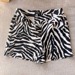 White House Black Market 
The 5” Tailored Short Zebra Print - Size 2